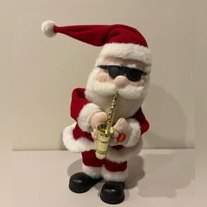 “Action” saxophone playing Santa Claus Holiday Decoration